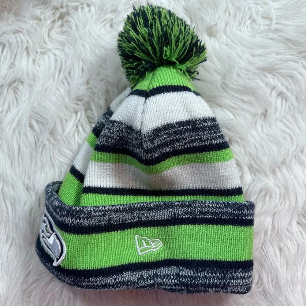 New Era • Official NFL Seattle Seahawks Striped Pom Pom Beanie - Picture 5 of 8